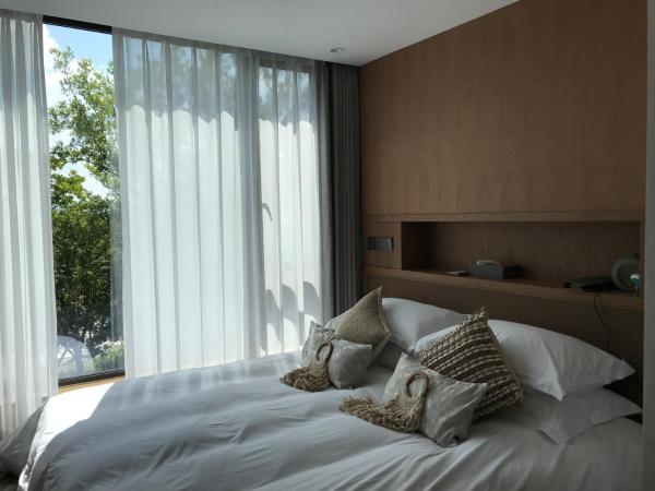 GINLAN JIA RESORT Yuhang Hangzhou : photo 3 de la chambre chambre double - vue sur jardin