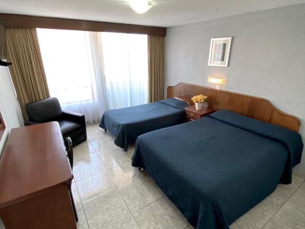 Hotel Qualitel Plus : photo 9 de la chambre chambre avec 2 lits doubles