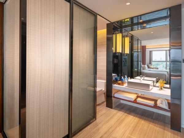 Xunguang Hotel - Chongqing Liangjiang Happiness Plaza : photo 5 de la chambre chambre lits jumeaux deluxe