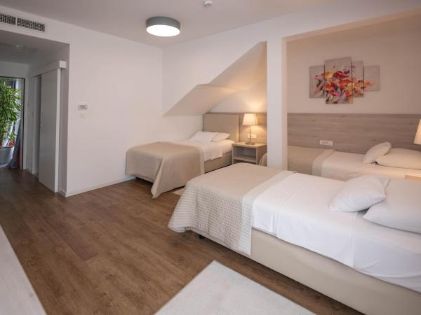 Hotel Magdalena : photo 1 de la chambre chambre triple