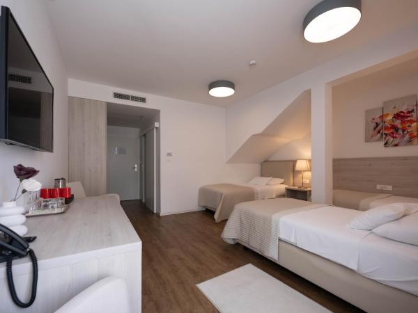 Hotel Magdalena : photo 2 de la chambre chambre triple