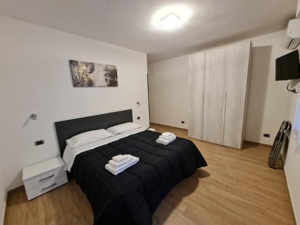 Monti Guest House Alghero : photo 3 de la chambre chambre lit king-size