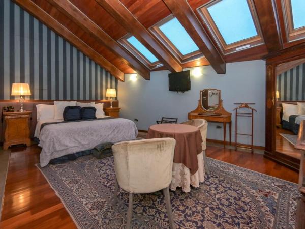 Hotel Dei Pittori : photo 1 de la chambre liberty family room