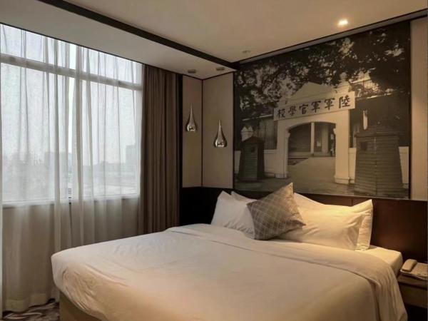 Guangdong Baiyun City Hotel : photo 2 de la chambre chambre lit queen-size deluxe