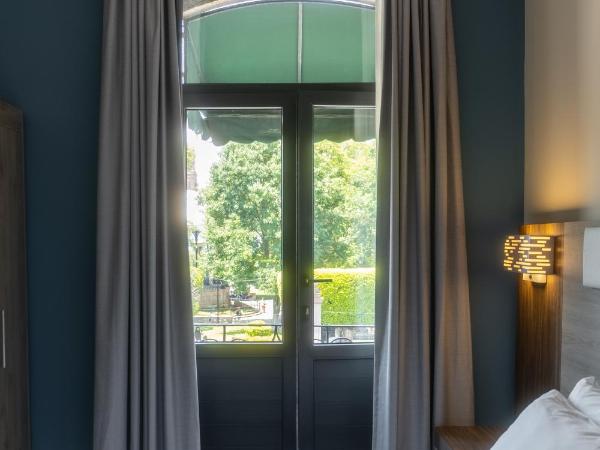 Holiday Inn Express Morelia Centro Historico : photo 1 de la chambre chambre standard avec balcon et vue sur la ville