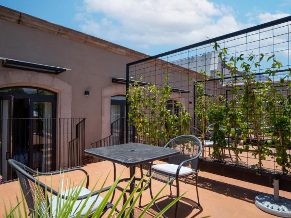 Holiday Inn Express Morelia Centro Historico : photo 2 de la chambre standard queen room with terrace and city view - central building