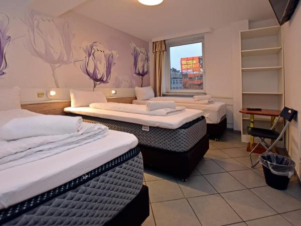 Ambiente by Next Inn : photo 2 de la chambre chambre triple avec salle de bains privative