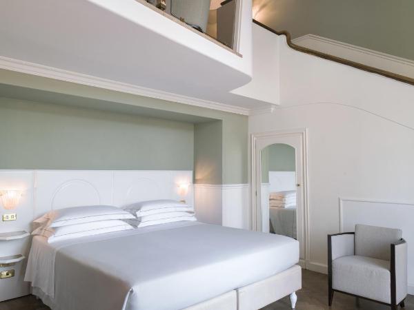 Plaza Hotel Lucchesi : photo 2 de la chambre suite familiale en duplex