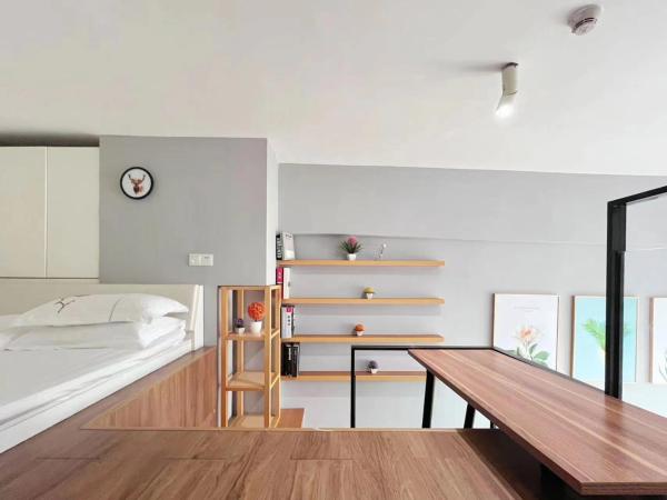 广州沃家国际公寓 : photo 7 de la chambre chambre double ou lits jumeaux deluxe - vue sur rivière