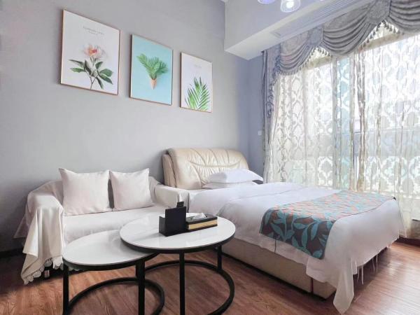 广州沃家国际公寓 : photo 1 de la chambre chambre double ou lits jumeaux deluxe - vue sur rivière