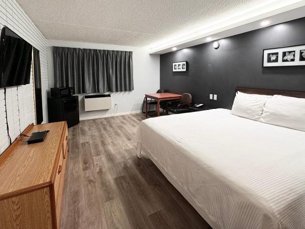 Travelodge by Wyndham Winnipeg Airport : photo 4 de la chambre chambre lit king-size - non-fumeurs