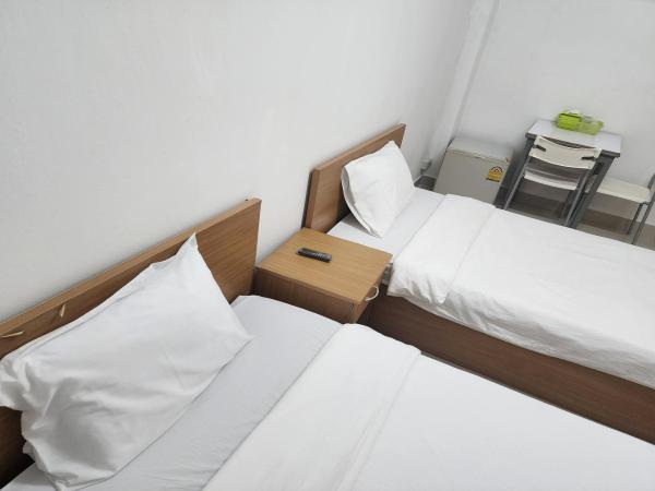 Green Apartment Kaset : photo 8 de la chambre chambre lits jumeaux standard