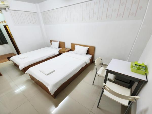 Green Apartment Kaset : photo 10 de la chambre chambre lits jumeaux standard