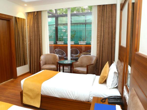 Karon Hotels - Lajpat Nagar : photo 4 de la chambre chambre double ou lits jumeaux avec balcon