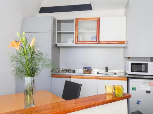 Rosario Suites : photo 2 de la chambre appartement en duplex