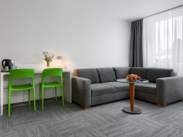 Płonia Resort : photo 4 de la chambre suite supérieure lit king-size