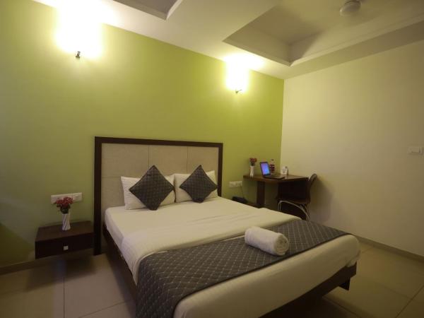 Ixora Suites : photo 2 de la chambre chambre deluxe