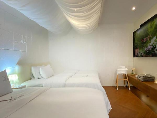 Garden Pool Villa Lee Chung Jung : photo 3 de la chambre suite - vue sur ville
