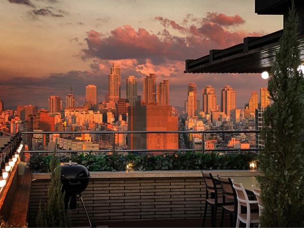 Garden Pool Villa Lee Chung Jung : photo 1 de la chambre suite - vue sur ville