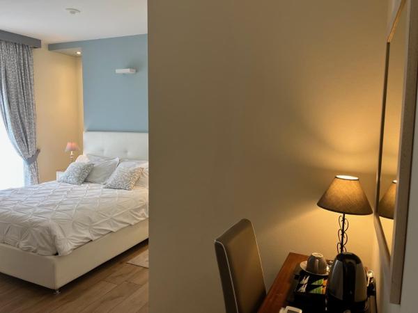 Relais Dei Mandorli : photo 2 de la chambre chambre triple avec salle de bains privative