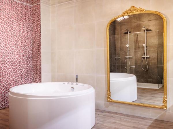 Belfry & Spa by Ligne St Barth : photo 6 de la chambre suite deluxe avec baignoire spa