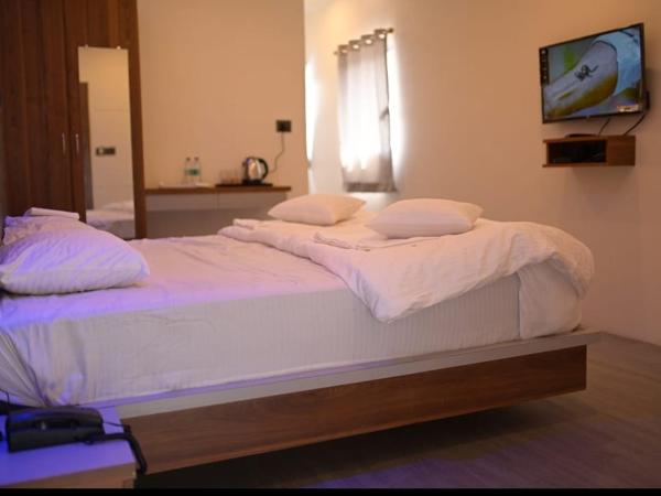 Hotel Kapila Inn Ranjangaon : photo 1 de la chambre chambre deluxe