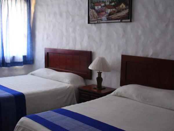 Hotel Quijote Inn : photo 10 de la chambre suite junior familiale