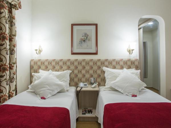 Paulista Flat : photo 7 de la chambre chambre lits jumeaux deluxe