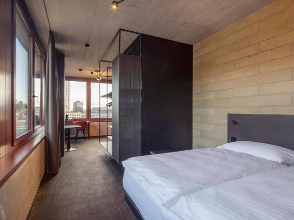 Tailormade Hotel LEO St Gallen : photo 2 de la chambre superior king (handicapped room)