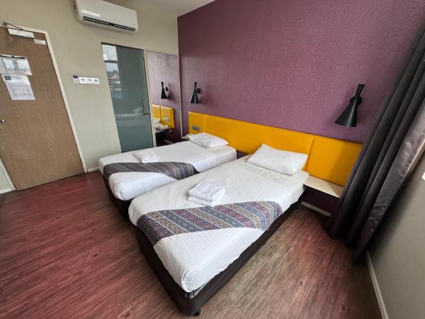 Win Win Boutique Hotel PD : photo 1 de la chambre chambre lits jumeaux de luxe avec fenêtre