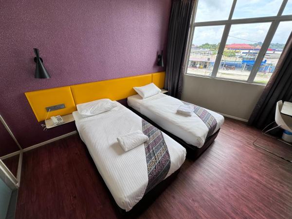 Win Win Boutique Hotel PD : photo 2 de la chambre chambre lits jumeaux de luxe avec fenêtre