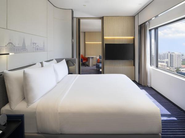 Crowne Plaza Bangkok Parc Lumpini : photo 1 de la chambre suite junior lit king-size avec kitchenette