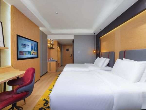 Park Inn by Radisson Chongqing Yuelai International Expo Center : photo 3 de la chambre chambre lits jumeaux confort