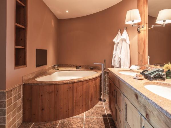 LeCrans : photo 2 de la chambre suite prestige (4 adultes + 2 enfants)