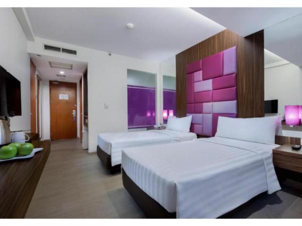 Quest Hotel Darmo - Surabaya by ASTON : photo 1 de la chambre chambre double ou lits jumeaux supérieure