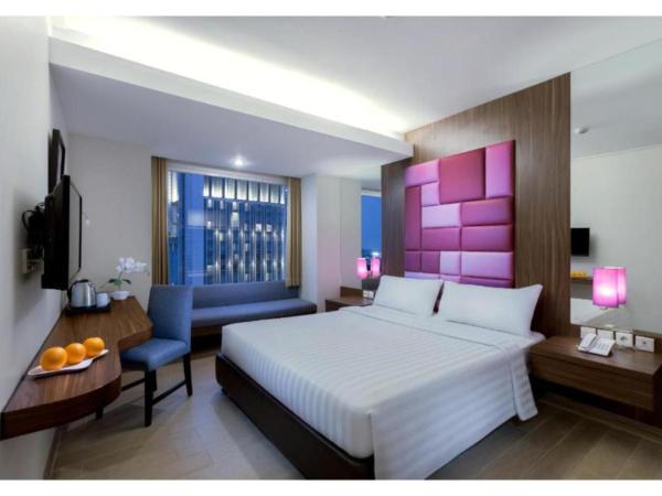 Quest Hotel Darmo - Surabaya by ASTON : photo 2 de la chambre chambre deluxe double ou lits jumeaux