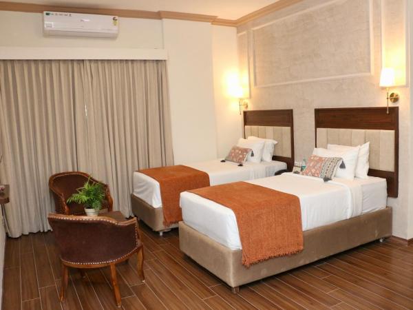 Nalapad's Hotel Bangalore International : photo 2 de la chambre chambre lits jumeaux