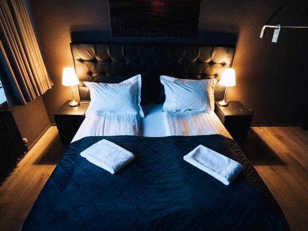 Brim Hotel : photo 5 de la chambre chambre familiale avec salle de bains privative