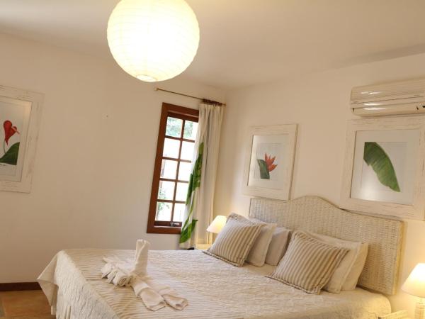 Pousada Baia Blanca : photo 3 de la chambre chambre quadruple - vue sur jardin