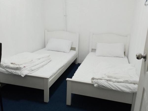 246housecafe : photo 2 de la chambre chambre lits jumeaux standard avec salle de bains commune