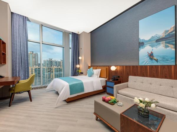 Sha Zhi Ye Serviced Apartment Hotel - Houjie Wanda Plaza Liaoxia Subway Station : photo 3 de la chambre chambre lit king-size deluxe