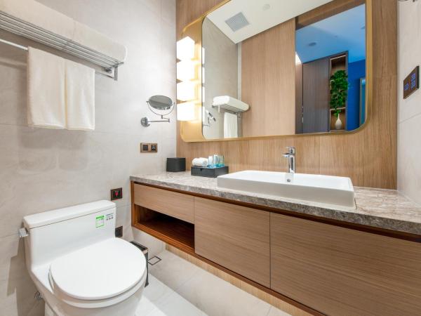 Sha Zhi Ye Serviced Apartment Hotel - Houjie Wanda Plaza Liaoxia Subway Station : photo 4 de la chambre chambre lits jumeaux supérieure