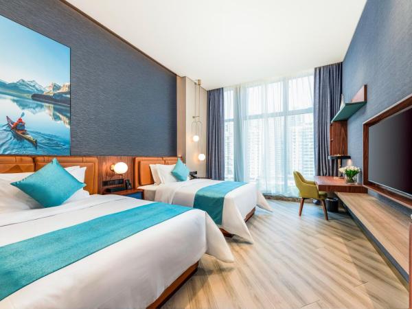 Sha Zhi Ye Serviced Apartment Hotel - Houjie Wanda Plaza Liaoxia Subway Station : photo 1 de la chambre chambre lits jumeaux supérieure