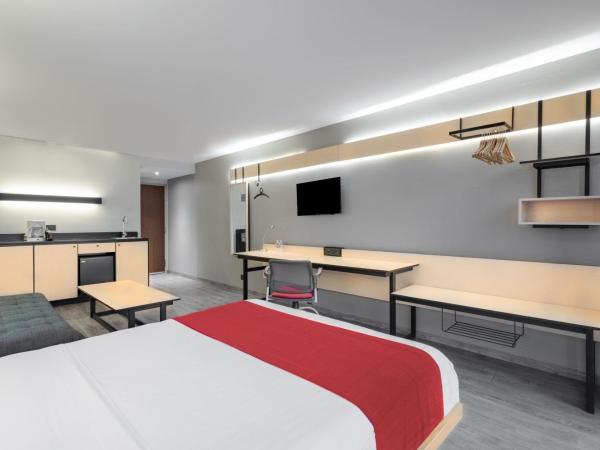 City Express by Marriott Guadalajara Aeropuerto : photo 2 de la chambre chambre lit queen-size supérieure avec canapé-lit