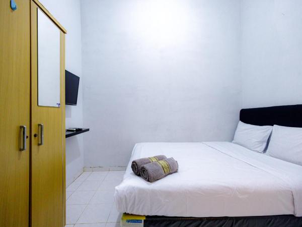 Marcello Residence Siwalankerto near Petra University Surabaya Mitra RedDoorz : photo 9 de la chambre chambre double standard