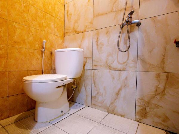 Marcello Residence Siwalankerto near Petra University Surabaya Mitra RedDoorz : photo 3 de la chambre chambre double standard