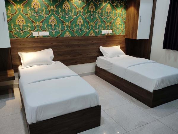 SR RESIDENCY : photo 1 de la chambre chambre lits jumeaux