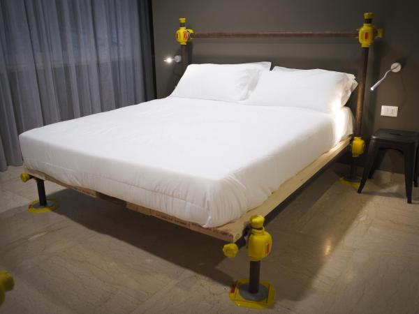 Hostelò - Luxury Hostel : photo 1 de la chambre chambre quadruple de luxe