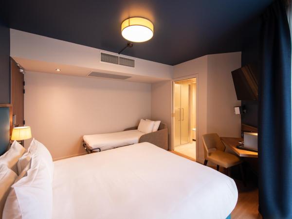 Hôtel de la Cité : photo 5 de la chambre chambre triple