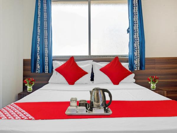 SPOT ON Swarg Executive Paradise Near Fun Time Multiplex : photo 8 de la chambre chambre triple classique